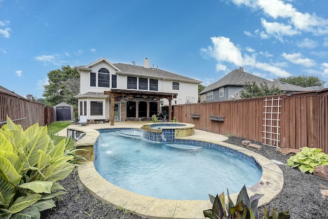 4205 English Ivy Dr, Mckinney, TX 75070 - view of pool with a fenced backyard, a storage shed, an outbuilding, and a pool with connected hot tub