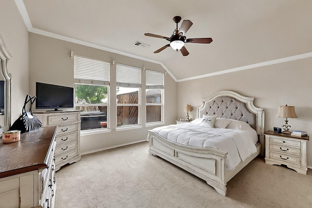bedroom with light carpet, ornamental molding, vaulted ceiling, baseboards, and ceiling fan