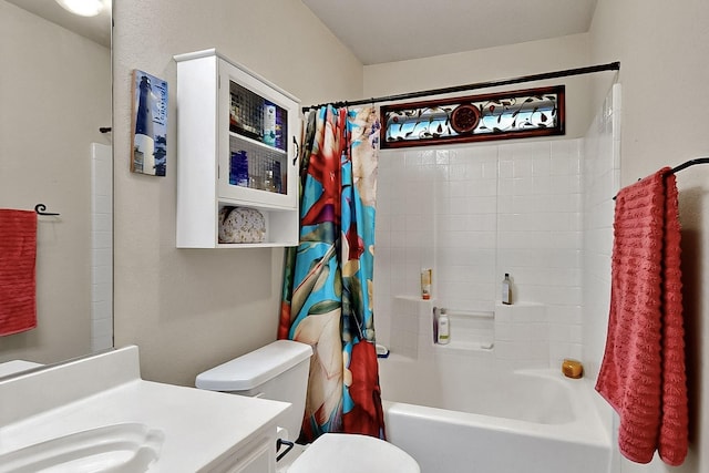 full bathroom featuring vanity, toilet, and shower / tub combo