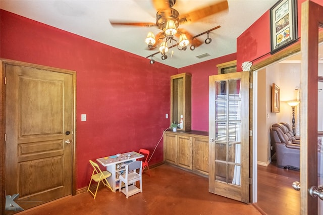 109 Fry Blvd, Tuscola, TX 79562 - dining room featuring a ceiling fan, baseboards, and concrete flooring