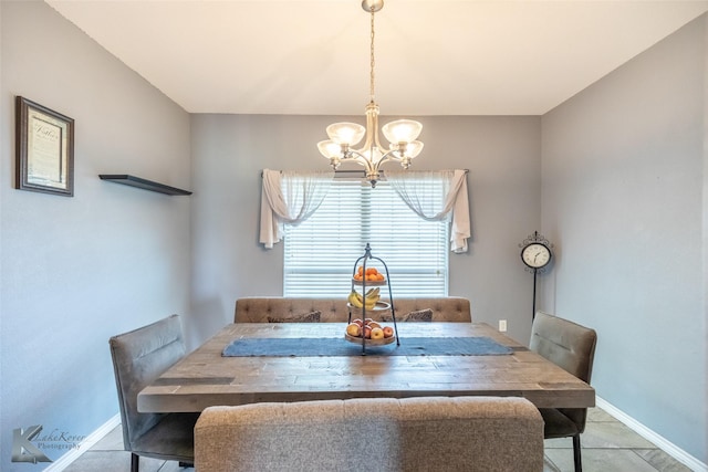 109 Fry Blvd, Tuscola, TX 79562 - tiled dining space with a chandelier and baseboards