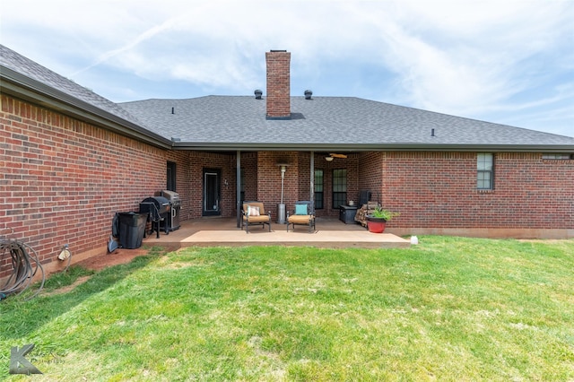 109 Fry Blvd, Tuscola, TX 79562 - rear view of property featuring brick siding, a chimney, a lawn, and roof with shingles