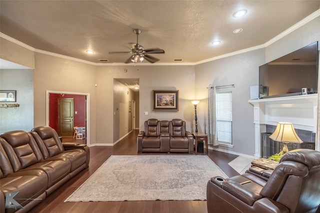 109 Fry Blvd, Tuscola, TX 79562 - living room with wood finished floors, ceiling fan, ornamental molding, recessed lighting, and baseboards