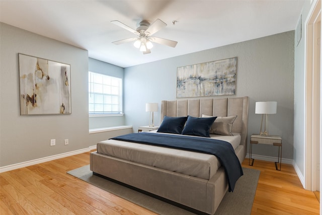 6000 Auburndale Ave Unit E, University Park, TX 75205 - bedroom with light wood-style flooring, baseboards, and a ceiling fan
