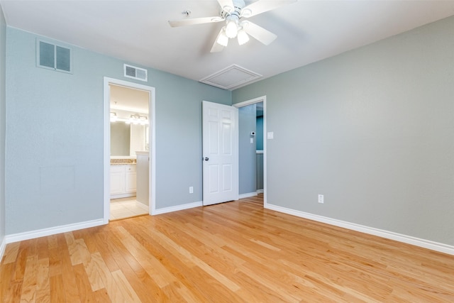 6000 Auburndale Ave Unit E, University Park, TX 75205 - unfurnished bedroom featuring light wood finished floors, baseboards, connected bathroom, ceiling fan, and attic access