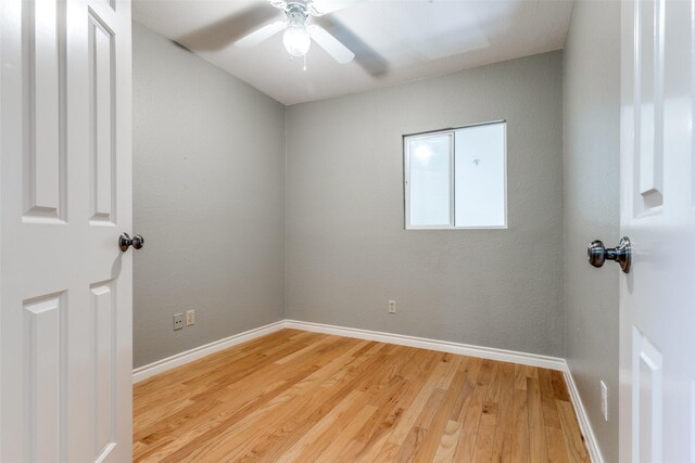 6000 Auburndale Ave Unit E, University Park, TX 75205 - empty room featuring light wood-type flooring, baseboards, and ceiling fan