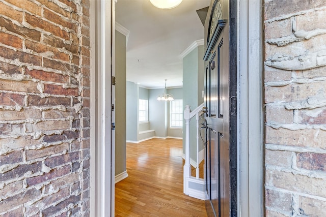 6000 Auburndale Ave Unit E, University Park, TX 75205 - hallway with crown molding, light wood finished floors, a chandelier, and baseboards