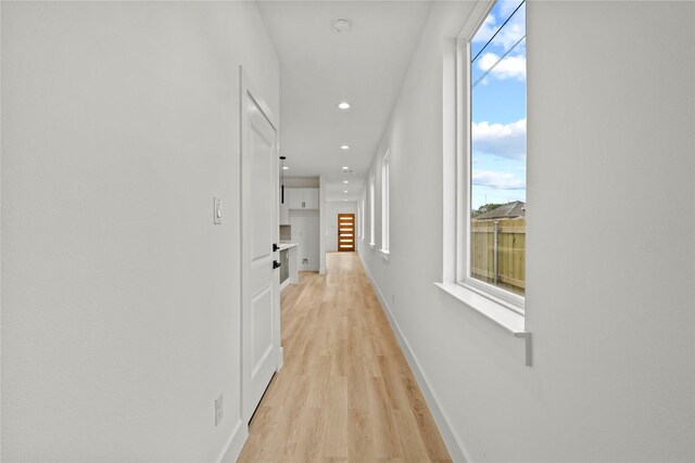 2534 Pennsylvania Ave, Dallas, TX 75215 - hallway featuring light wood-type flooring, recessed lighting, and baseboards