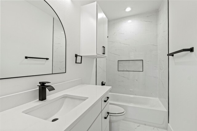 2534 Pennsylvania Ave, Dallas, TX 75215 - full bathroom with marble finish flooring, vanity, toilet, recessed lighting, and shower / bathtub combination