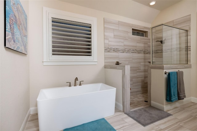 1100 Whisper Willows Dr, Fort Worth, TX 76052 - full bath featuring a walk in shower, a freestanding tub, baseboards, recessed lighting, and vaulted ceiling