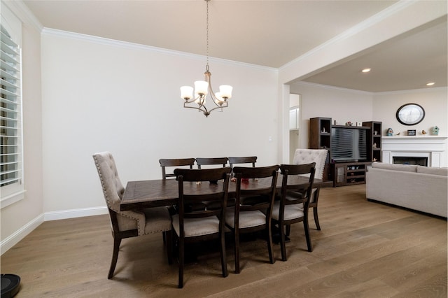 1100 Whisper Willows Dr, Fort Worth, TX 76052 - dining room featuring a chandelier, ornamental molding, light wood finished floors, recessed lighting, and baseboards