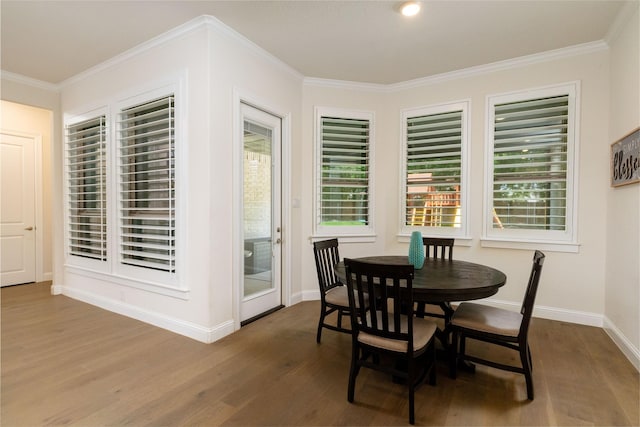 1100 Whisper Willows Dr, Fort Worth, TX 76052 - dining room with dark wood-type flooring, baseboards, ornamental molding, and plenty of natural light