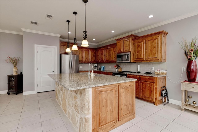140 Pine Rd, Poolville, TX 76487 - kitchen with stainless steel appliances, light tile patterned floors, tasteful backsplash, light stone counters, and an island with sink