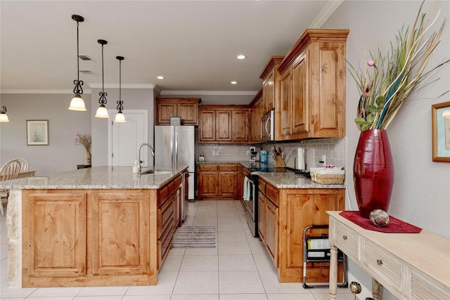 140 Pine Rd, Poolville, TX 76487 - kitchen featuring stainless steel appliances, crown molding, brown cabinetry, backsplash, and light tile patterned flooring