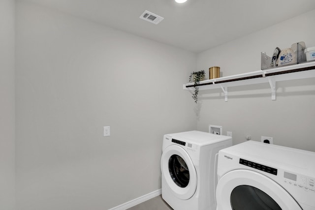 1403 Blossom Court Dr, Princeton, TX 75407 - washroom featuring washer and dryer and baseboards