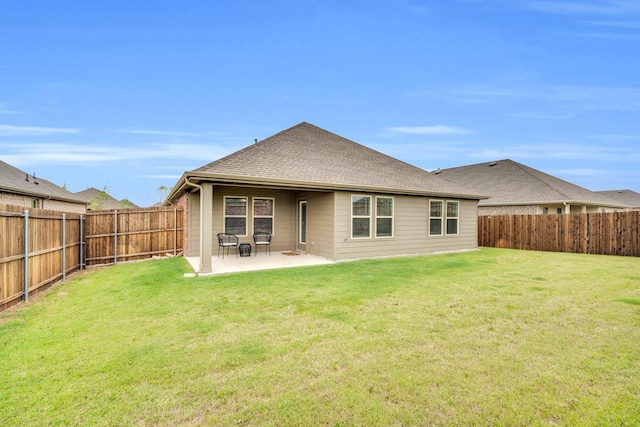 1403 Blossom Court Dr, Princeton, TX 75407 - rear view of house with a patio area and roof with shingles