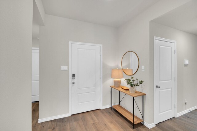 1403 Blossom Court Dr, Princeton, TX 75407 - foyer with wood finished floors and baseboards