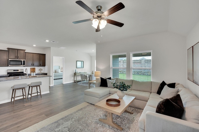 1403 Blossom Court Dr, Princeton, TX 75407 - living area featuring healthy amount of natural light, light wood-style flooring, recessed lighting, ceiling fan, and baseboards