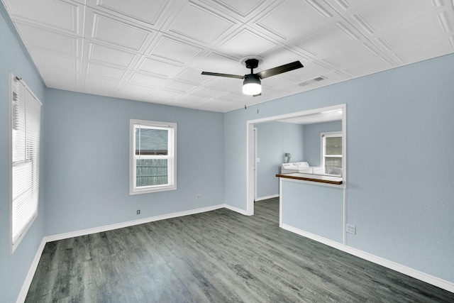 121 Chowning Dr, Desoto, TX 75115 - unfurnished room featuring wood finished floors, ceiling fan, an ornate ceiling, and baseboards