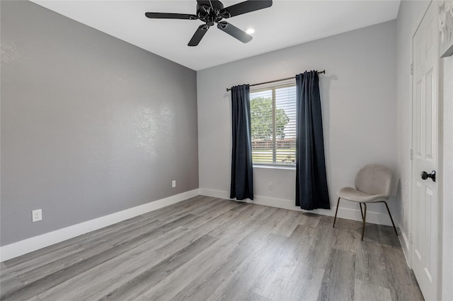 203 Mcelroy St, Southmayd, TX 76273 - spare room with wood finished floors, baseboards, and a ceiling fan