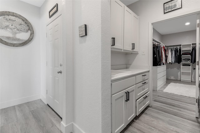 203 Mcelroy St, Southmayd, TX 76273 - walk in closet featuring light wood finished floors