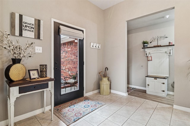 2630 Argyle Shore Dr, Rockwall, TX 75087 - entryway featuring light tile patterned floors and baseboards