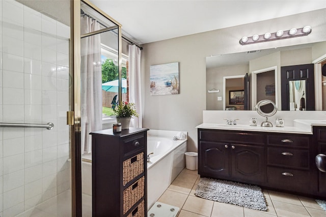 2630 Argyle Shore Dr, Rockwall, TX 75087 - full bath featuring a garden tub, vanity, a shower stall, and tile patterned flooring