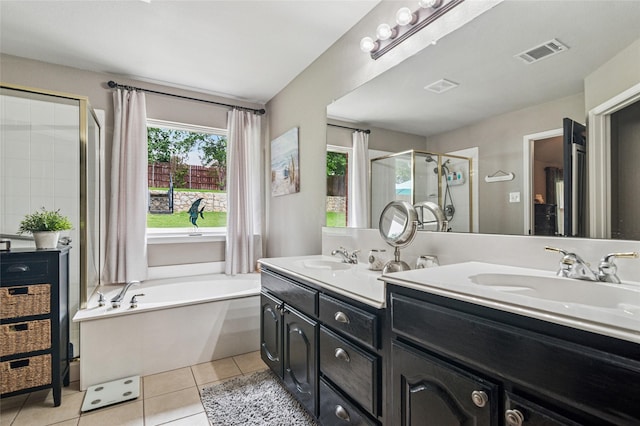 2630 Argyle Shore Dr, Rockwall, TX 75087 - full bathroom featuring a shower stall, tile patterned floors, double vanity, and a bath
