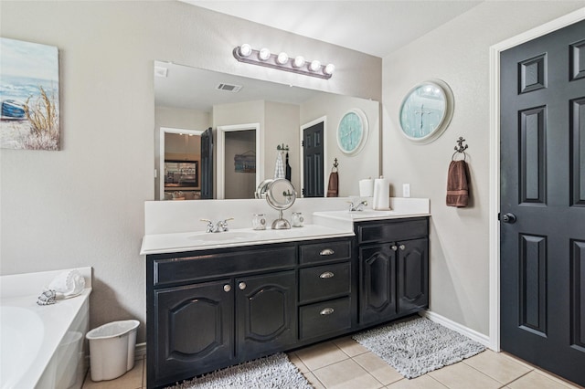 2630 Argyle Shore Dr, Rockwall, TX 75087 - full bathroom featuring tile patterned floors, double vanity, and a garden tub