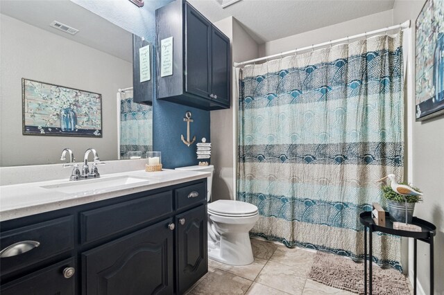 2630 Argyle Shore Dr, Rockwall, TX 75087 - full bathroom featuring toilet, vanity, and a shower with shower curtain