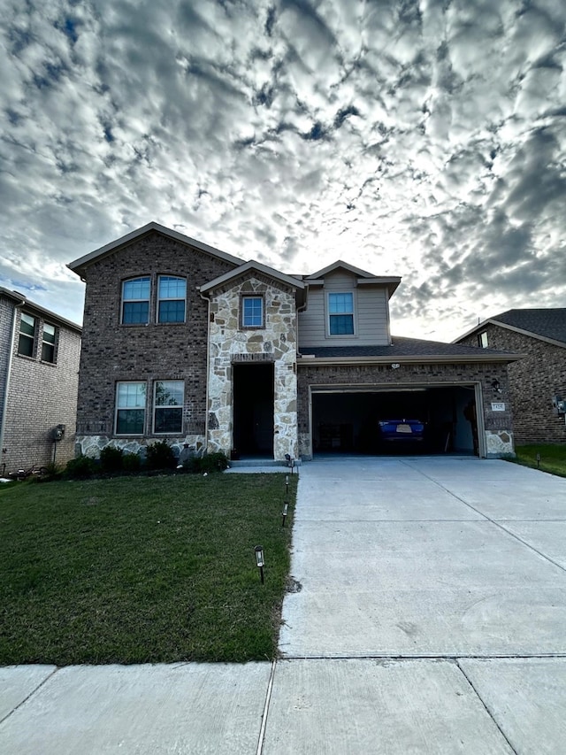 7425 Bledington Ln, Mckinney, TX 75071 - french country style house featuring driveway, a front yard, and stone siding