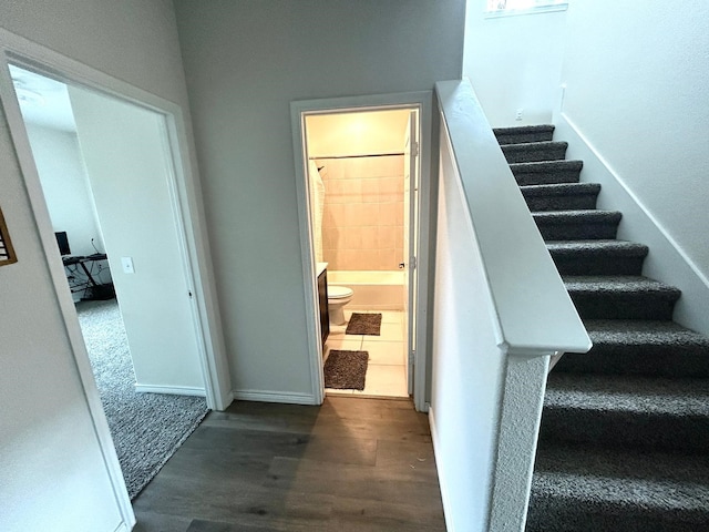 7425 Bledington Ln, Mckinney, TX 75071 - stairs with wood finished floors and baseboards
