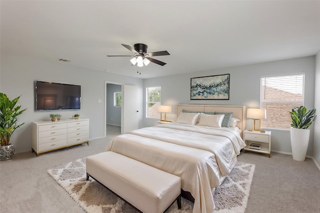 8537 Star Thistle Dr, Fort Worth, TX 76179 - bedroom with light carpet, a ceiling fan, and baseboards