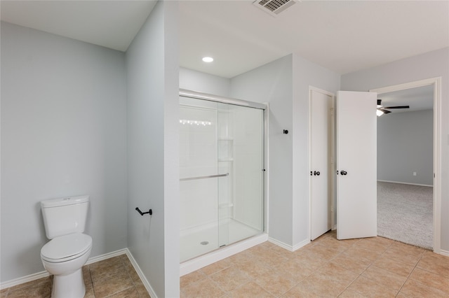 8537 Star Thistle Dr, Fort Worth, TX 76179 - full bathroom featuring a shower stall, toilet, baseboards, and tile patterned flooring
