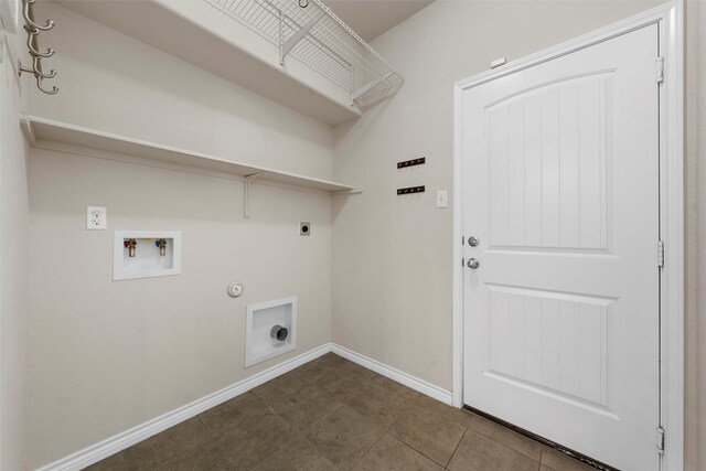 5541 Wisdom Ct, Waco, TX 76708 - clothes washing area featuring hookup for an electric dryer, washer hookup, baseboards, and hookup for a gas dryer