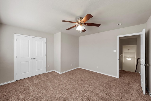 5541 Wisdom Ct, Waco, TX 76708 - unfurnished bedroom with carpet flooring, a closet, a ceiling fan, and baseboards