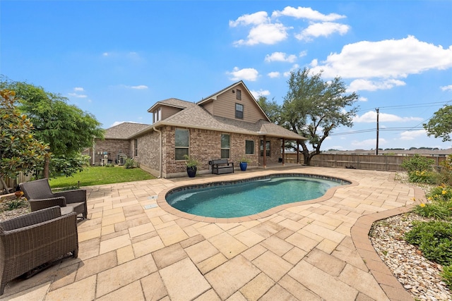 5541 Wisdom Ct, Waco, TX 76708 - view of swimming pool featuring a patio and a fenced backyard