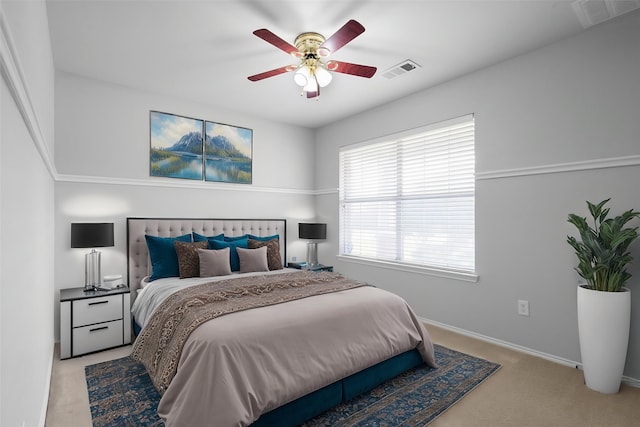 3432 Beatriz Dr, Denton, TX 76207 - bedroom with baseboards, light carpet, and ceiling fan