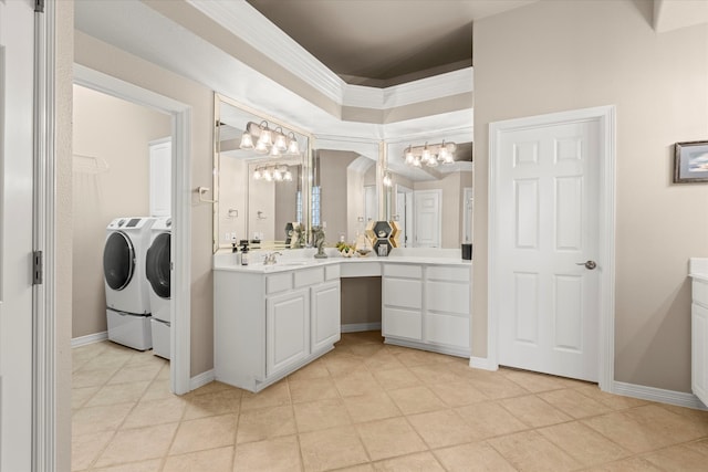 5581 Travis Dr, Frisco, TX 75034 - full bathroom with a chandelier, washing machine and clothes dryer, vanity, and tile patterned floors