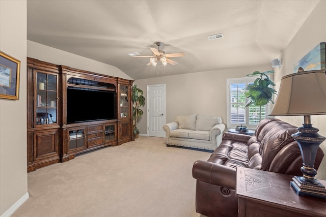 5581 Travis Dr, Frisco, TX 75034 - living room featuring lofted ceiling, baseboards, ceiling fan, and light colored carpet