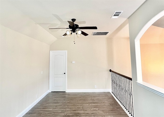 2095 Deckard, Princeton, TX 75407 - empty room featuring a ceiling fan, wood finished floors, arched walkways, and baseboards