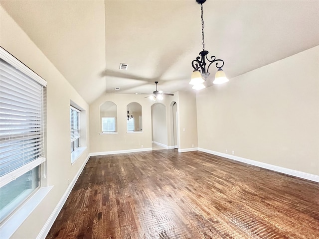 2095 Deckard, Princeton, TX 75407 - unfurnished living room featuring a chandelier, arched walkways, wood finished floors, vaulted ceiling, and a ceiling fan
