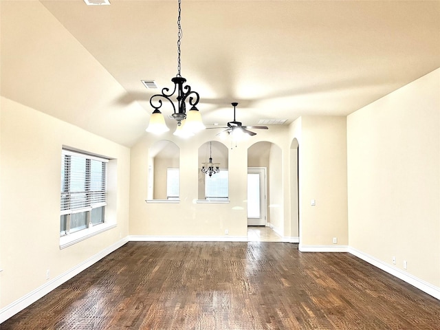 2095 Deckard, Princeton, TX 75407 - spare room with dark wood finished floors, ceiling fan, arched walkways, a chandelier, and baseboards