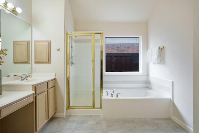 4525 Crooked Ridge Dr, The Colony, TX 75056 - bathroom featuring a stall shower, a bath, vanity, and baseboards