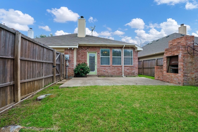 4525 Crooked Ridge Dr, The Colony, TX 75056 - rear view of property with a fireplace, a patio area, brick siding, and a chimney