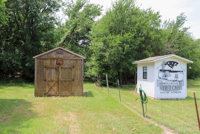 813 Sam Bass Rd, Mcgregor, TX 76657 - view of shed with view of scattered trees