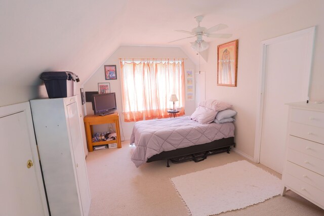 813 Sam Bass Rd, Mcgregor, TX 76657 - bedroom featuring carpet, vaulted ceiling, and a ceiling fan