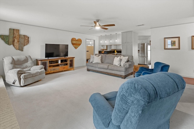1247 Wedgewood Dr, Cleburne, TX 76033 - carpeted living area featuring a ceiling fan