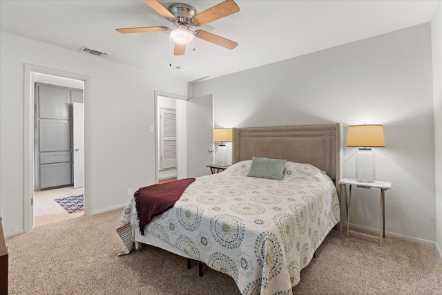 1247 Wedgewood Dr, Cleburne, TX 76033 - bedroom with carpet, baseboards, ceiling fan, and connected bathroom