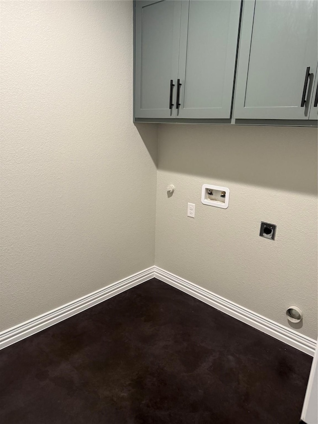 401 Pecan St, Grandview, TX 76050 - laundry room with electric dryer hookup, baseboards, cabinet space, and hookup for a washing machine
